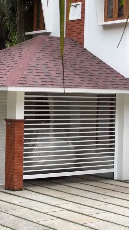 An automated rolling shutter opening at a property