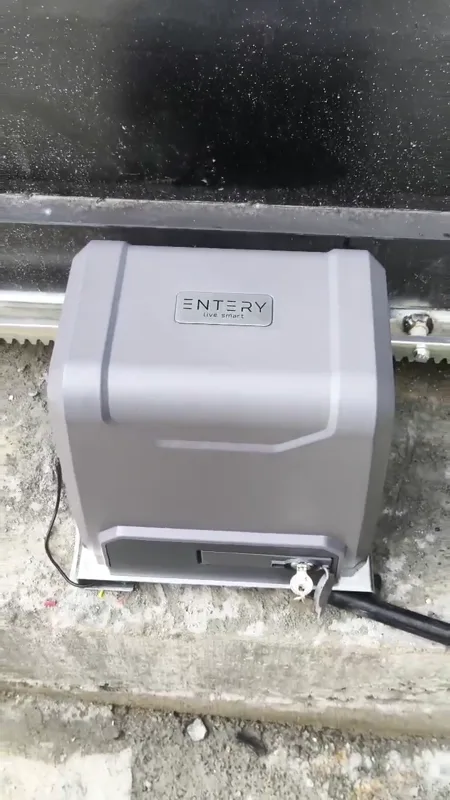 A gate motor and remote-controlled sliding gate