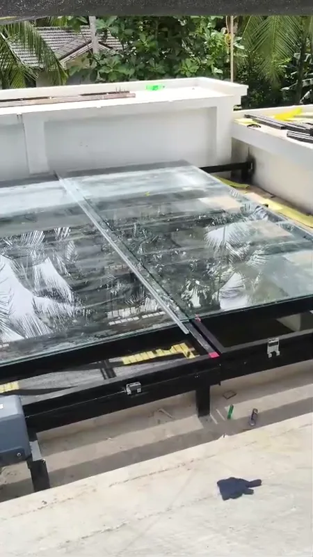 Sliding glass roof system in operation